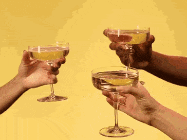 three glasses of wine tossing