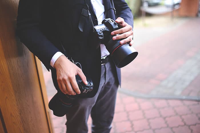 photographer with cameras